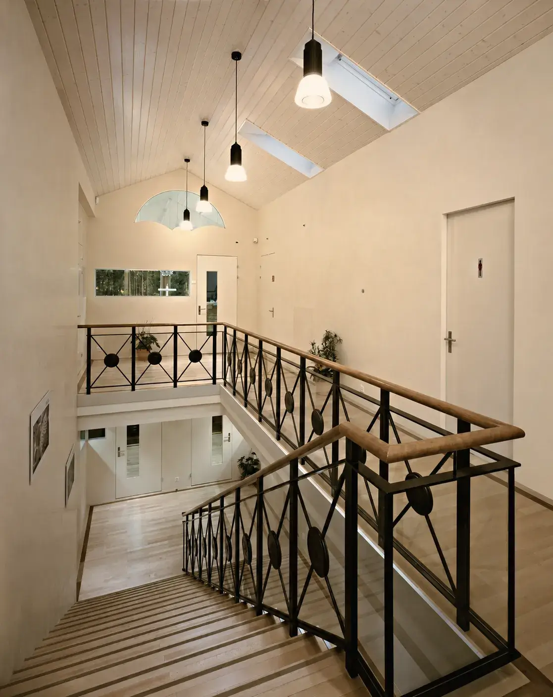Staircase landing and glazed gallery at Blancpain