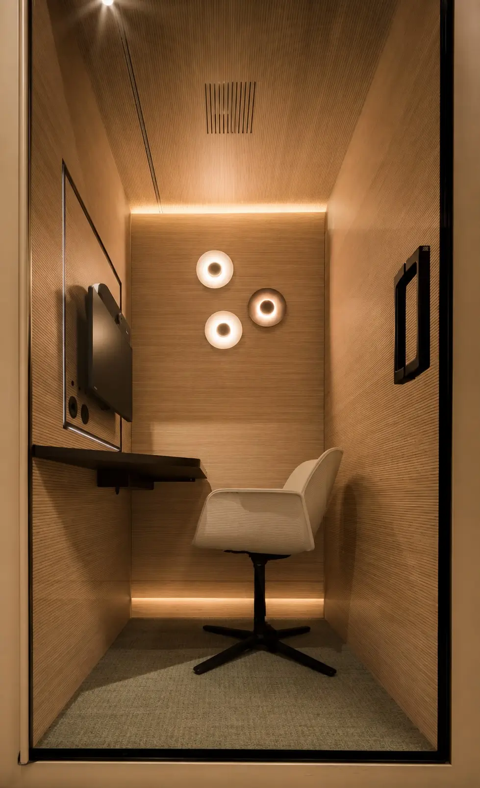 Acoustic booth bathed in soft light for concentration or informal conversation